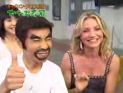 Cameron Smiles & Nods On Japanese TV